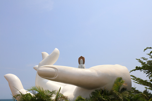 Sanya City, China - April 2, 2019: Guanyin sculpture on the sea in Nanshan tourist area, Sanya City, Hainan Province, China