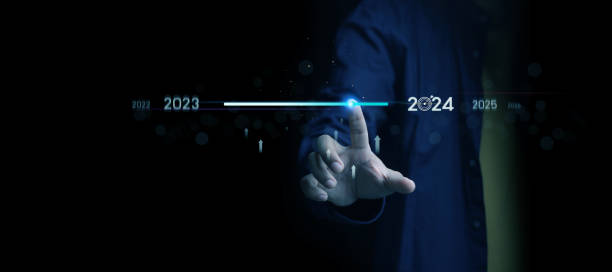 istock Countdown to 2024 concept. the taps a virtual download bar with a loading progress meter on New Year's Eve, turning the year 2023 to 2024. 1873889608