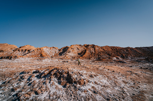 Adventurer exploring the Atacama salt desert