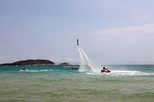 Sanya City, China - April 1, 2019: Water flying man amusement project in Yalong Bay, Sanya City, Hainan Province, China