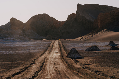 Car moving forward on dirt road in Atacama