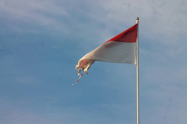 Old Indonesian flag on the wind