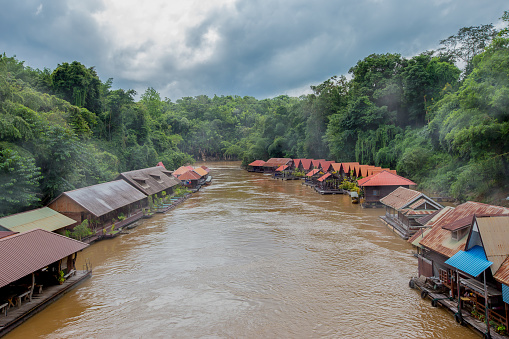 Tropical Resort wooden house floating and mountain on river kwai at sai yok,kanchanaburi,thailand