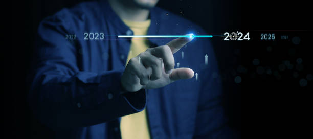 istock Countdown to 2024 concept. the taps a virtual download bar with a loading progress meter on New Year's Eve, turning the year 2023 to 2024. 1873920608