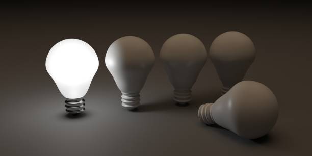 istock Illuminated light bulb standing Out in Crowd. Creative idea and inspire innovation 1873927377