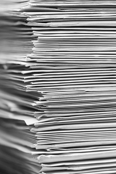 istock Large pile of white envelopes unevenly stacked 187392772