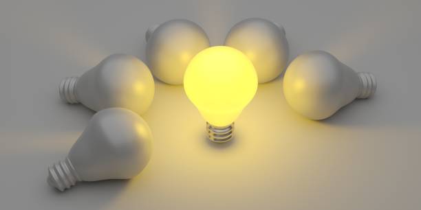 istock Illuminated light bulb standing Out in Crowd. Creative idea and inspire innovation 1873927889