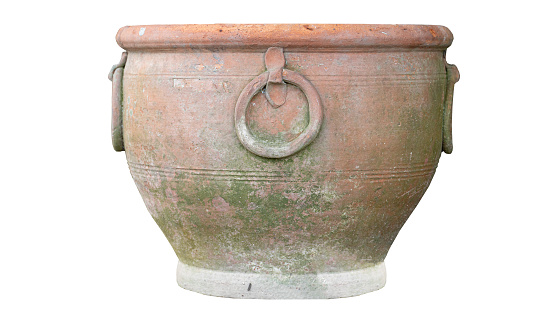 A pot made from terracotta with a round loop like a handle decorating the side. On isolated white background. With Clipping Path.