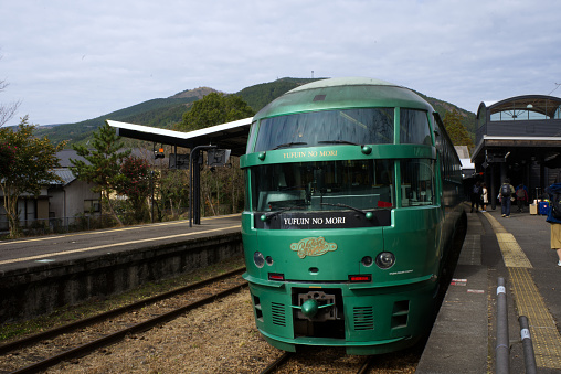 Yufuin, Japan - December 9 2022: Yufuin No Mori Train is the famous and signature train for travellers to go to Yufuin city