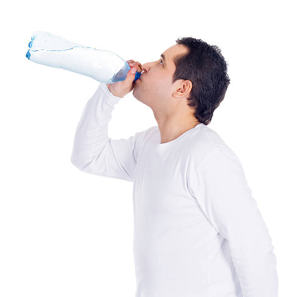 istock Portrait of a young man drinking water 187398342