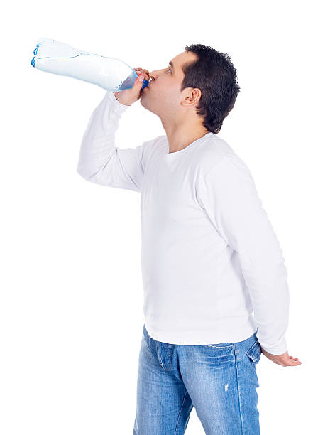 istock Portrait of a young man drinking water 187398447