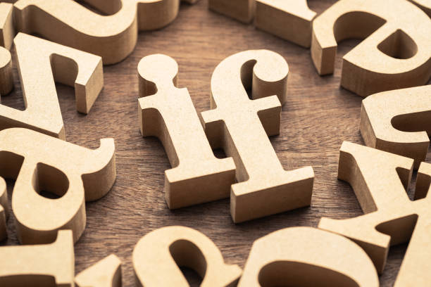 istock IF word in scattered wooden alphabets 1874010458