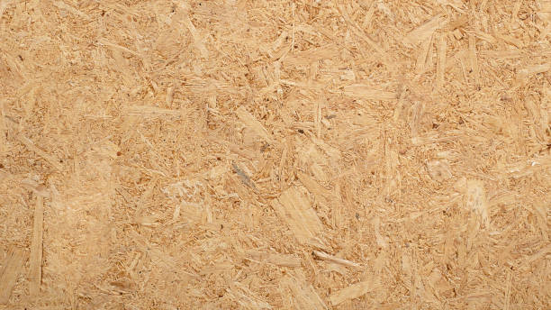 istock Particle board wooden panel. Warm wooden texture background. Wood texture seamless. 1874031266
