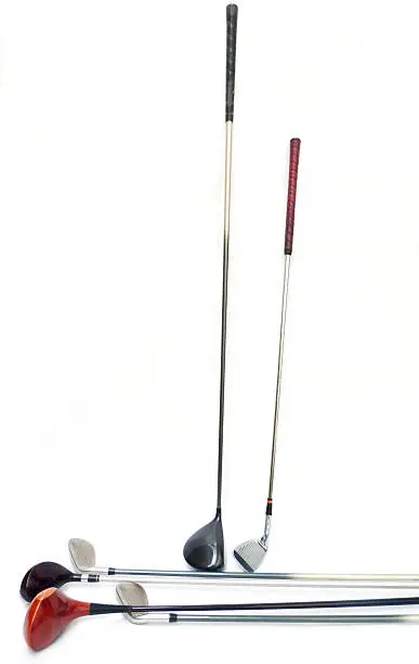 Three diferent golf clubs on white background.