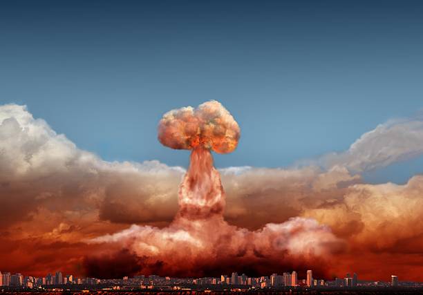 istock Composite image of atomic explosion behind a mock up city 187407316