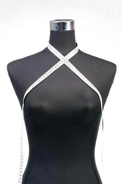 istock fashion dummy with measuring tape 187407461