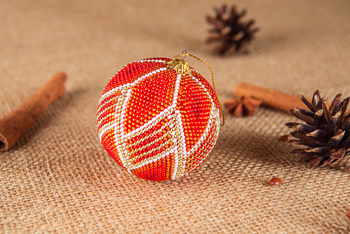 Exquisite handmade Christmas bubble toy from beads, also known as a Christmas globe or Christmas bulb, is a part of holiday decor