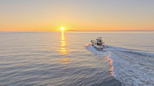 Couple sailing yacht over ocean