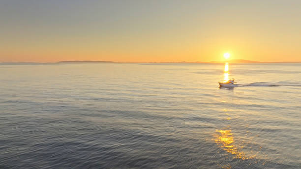 istock Yacht cruising fast in ocean 1874145854