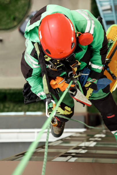 istock Industrial mountaineering worker during high rise work 1874147422