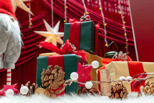 istock Santa Claus and Christmas gift boxes close up at horizontal composition 1874172247