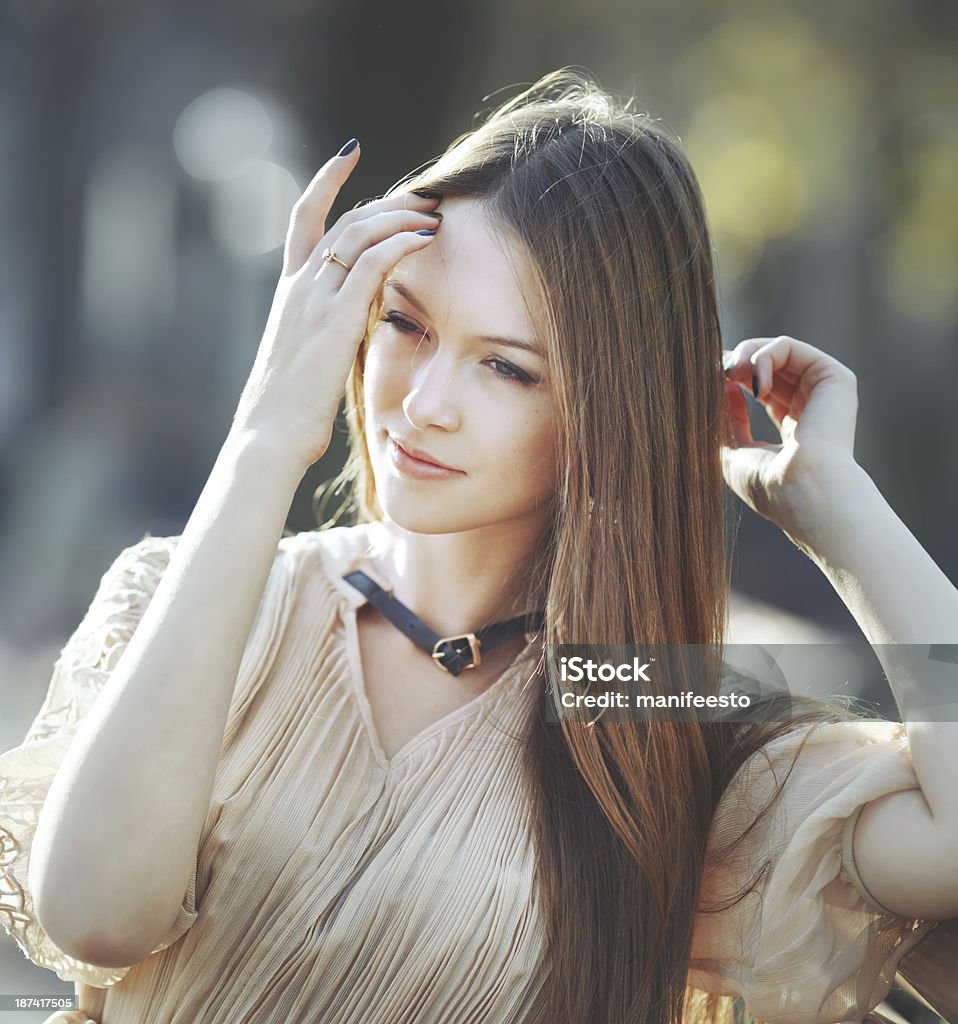 beautiful red hair young woman Portrait of a beautiful red hair young woman outdoor. Adult Stock Photo
