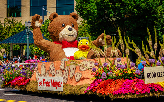 Portland, Oregon, USA - June 10, 2023: Fred Meyer Float in the Grand Floral Parade, during Portland Rose Festival 2023.