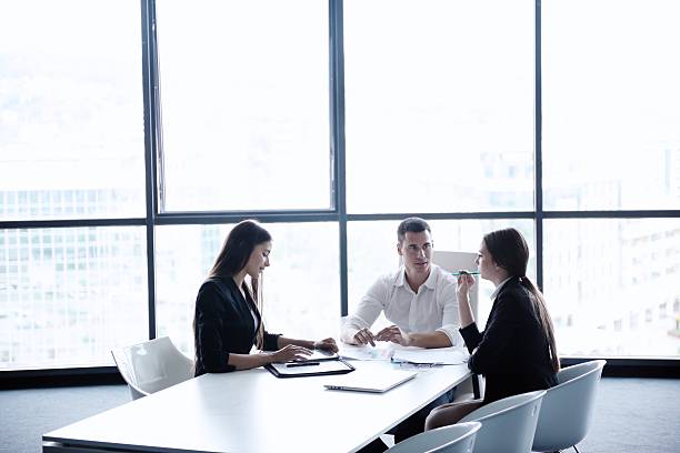 istock business people in a meeting at office 187419401