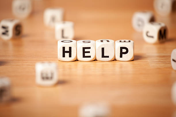 istock The Word Help Spelled In Letter Cubes 187420517