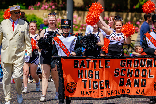 Portland, Oregon, USA - June 10, 2023: Battle Ground High School Marching Band in the Grand Floral Parade, during Portland Rose Festival 2023.