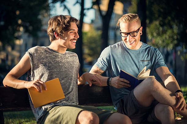 istock Guys Reading at the Park 187424573