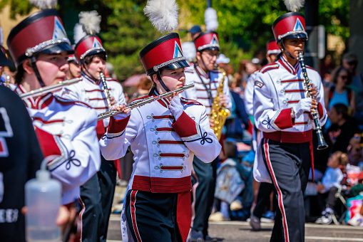 Portland, Oregon, USA - June 10, 2023: Tualatin High School Timberwolves Marching Band in the Grand Floral Parade, during Portland Rose Festival 2023.