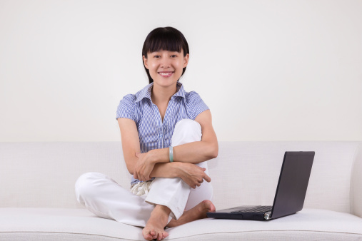 Asian Young Woman Working at home