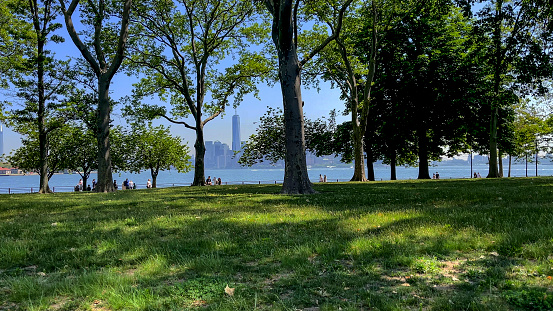Liberty Island Park, where the Statue of Liberty is located with the New York skyline in the background.