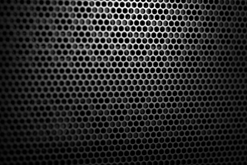 Black speaker grille background
