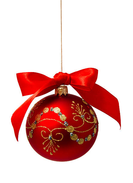 istock Red christmas ball with ribbon isolated on a white 187429289