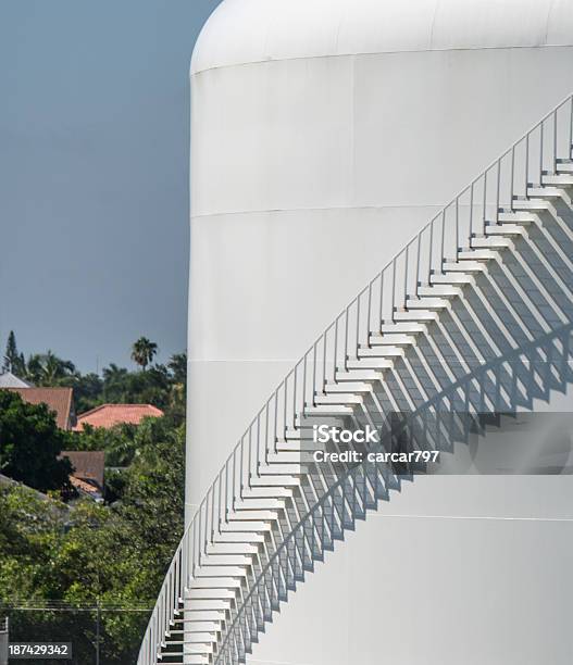 Oil Storage Tank With Nearby Houses Stock Photo - Download Image Now - Community, Fuel Storage Tank, Fuel and Power Generation