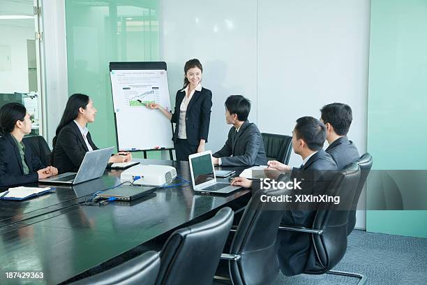 Business People Having Meeting Stock Photo - Download Image Now - 20-24 Years, 25-29 Years, 35-39 Years