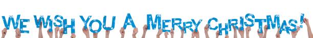 istock Hands Holding We Wish You A Merry Christmas 187429856