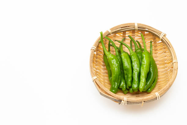 istock Shishito peppers on a white background. 1874309659