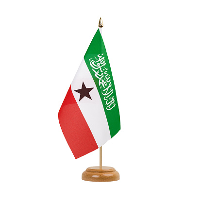 A beautiful miniature Somaliland desk flag isolated on a white background. The little pennant is elegantly attached to a small wooden flag stand.