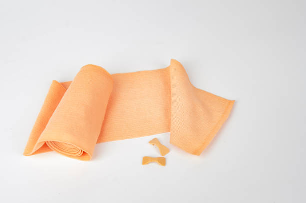 istock Bandage elastic tape medical wrap isolated on the white background 1874353817