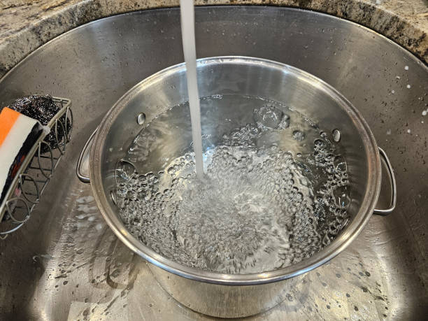 istock Water filling a pot 1874357495