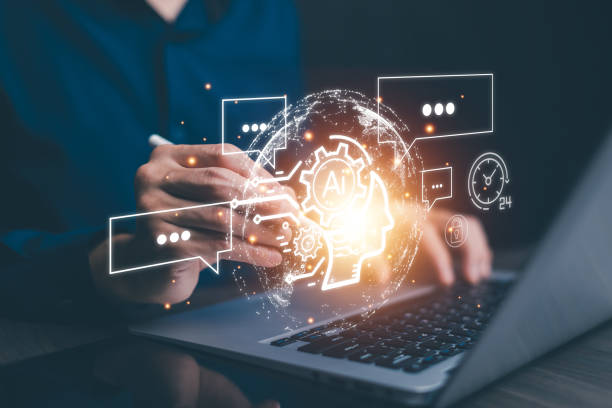 istock AI tech, Business person chatting with a smart AI using an artificial intelligence chatbot developed by OpenAI, Artificial Intelligence, Futuristic technology transformation, Searching for Education 1874372855