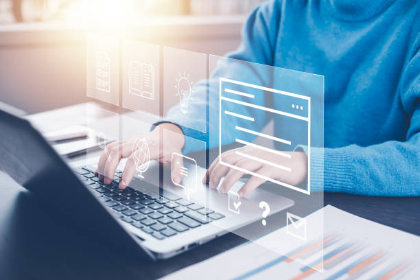 istock Online survey filling out and digital form checklist by laptop computer, Document Management Checking System, online documentation database and process manage files. 1874373903