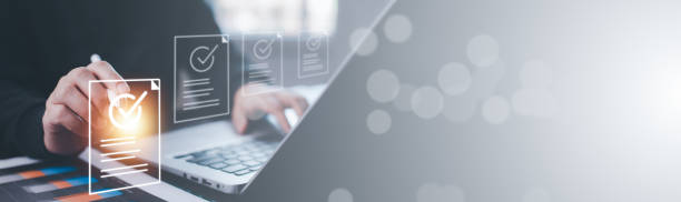 istock Checklist and clipboard task documentation management Online survey, form checklist by laptop computer, Document Management Checking System, online documentation database and process manage files. 1874376467