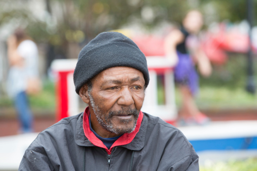 African american homeless man outdoors posing for portrait