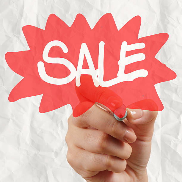 istock word sale with crumpled pape rbackground 187438424