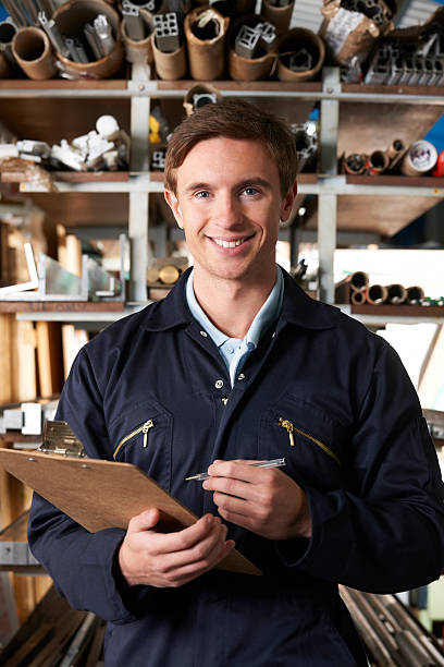 istock Worker Checking Stock In Factory 187438965