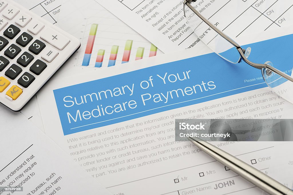 Medicare payments summary Medicare payments summary with paperwork Financial Bill Stock Photo